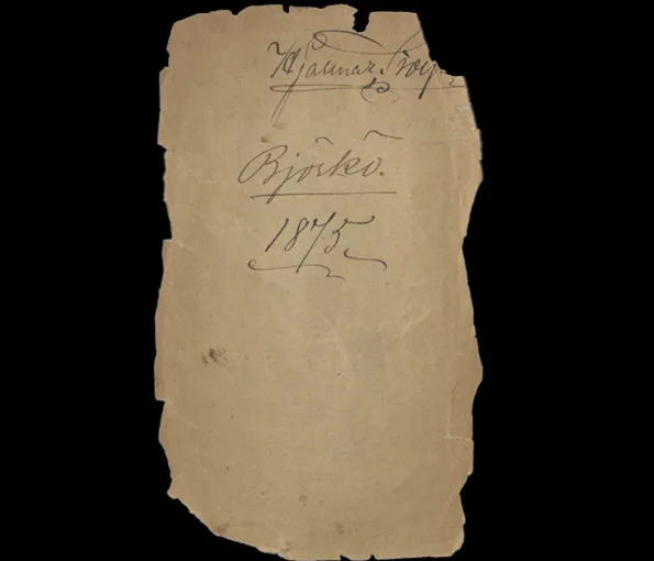 Pappersbit med kursiv text