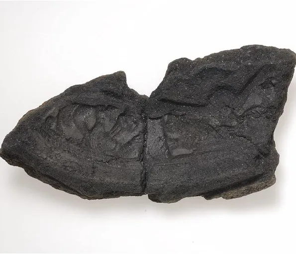 Metalldel från ett okänt föremål